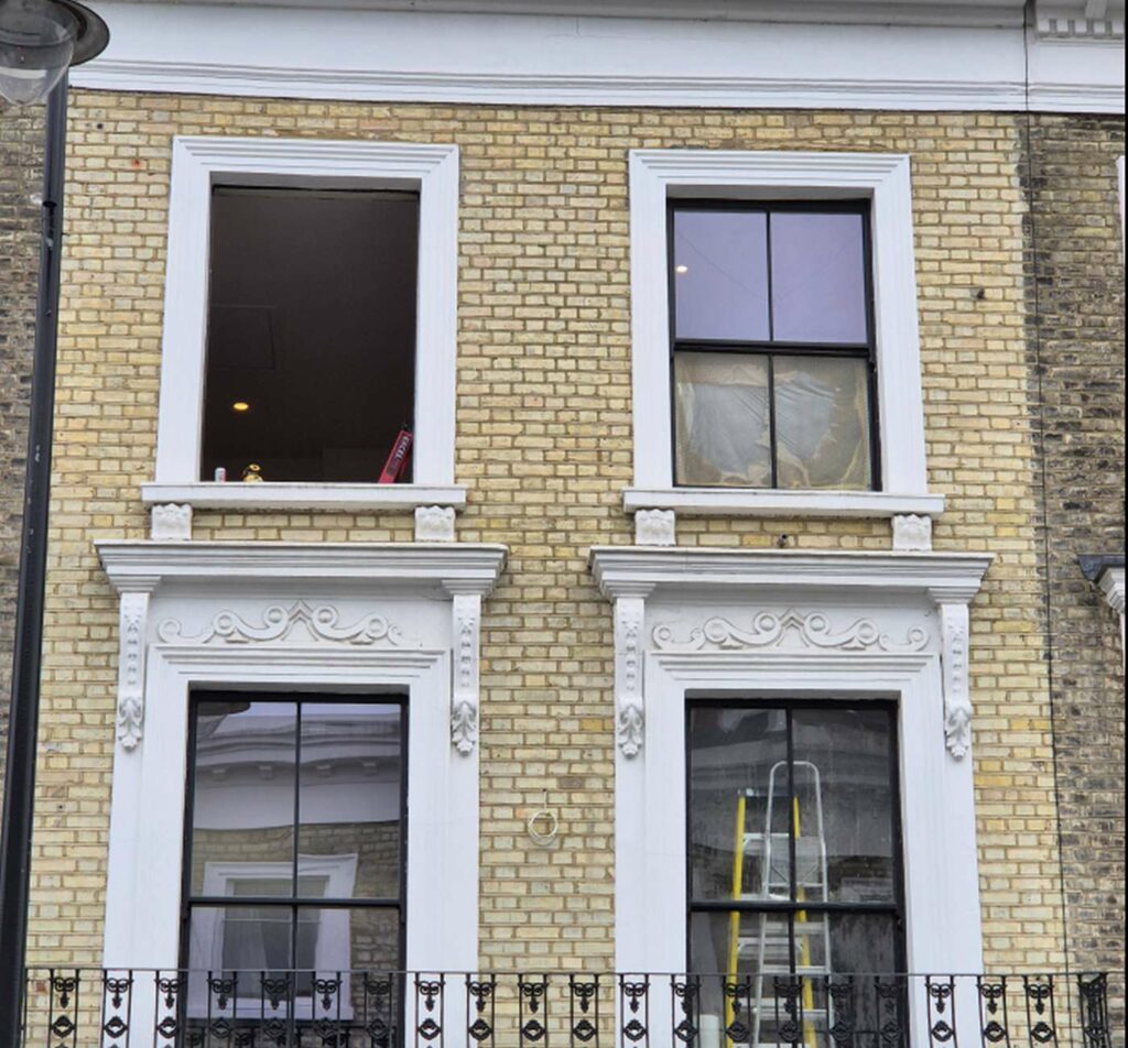 Listed Victorian property in Notting Hill with black timber sash windows