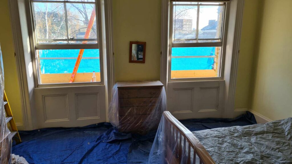 Bedroom protected before sash window repair work