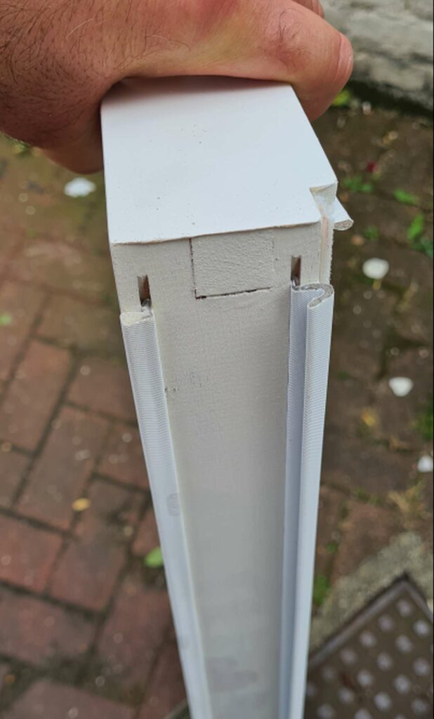 Cross-section of a timber sash profile with draught seals