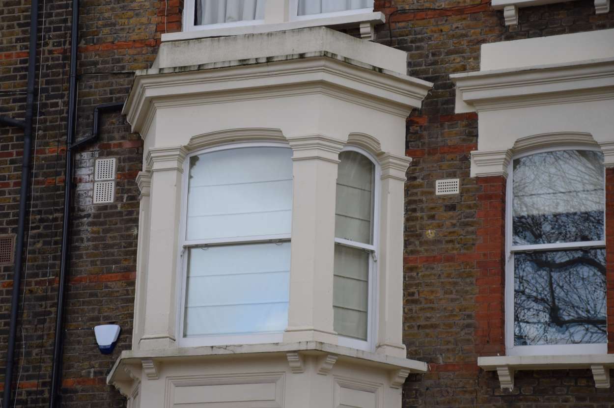 Timber bay sash window on a Victorian London property
