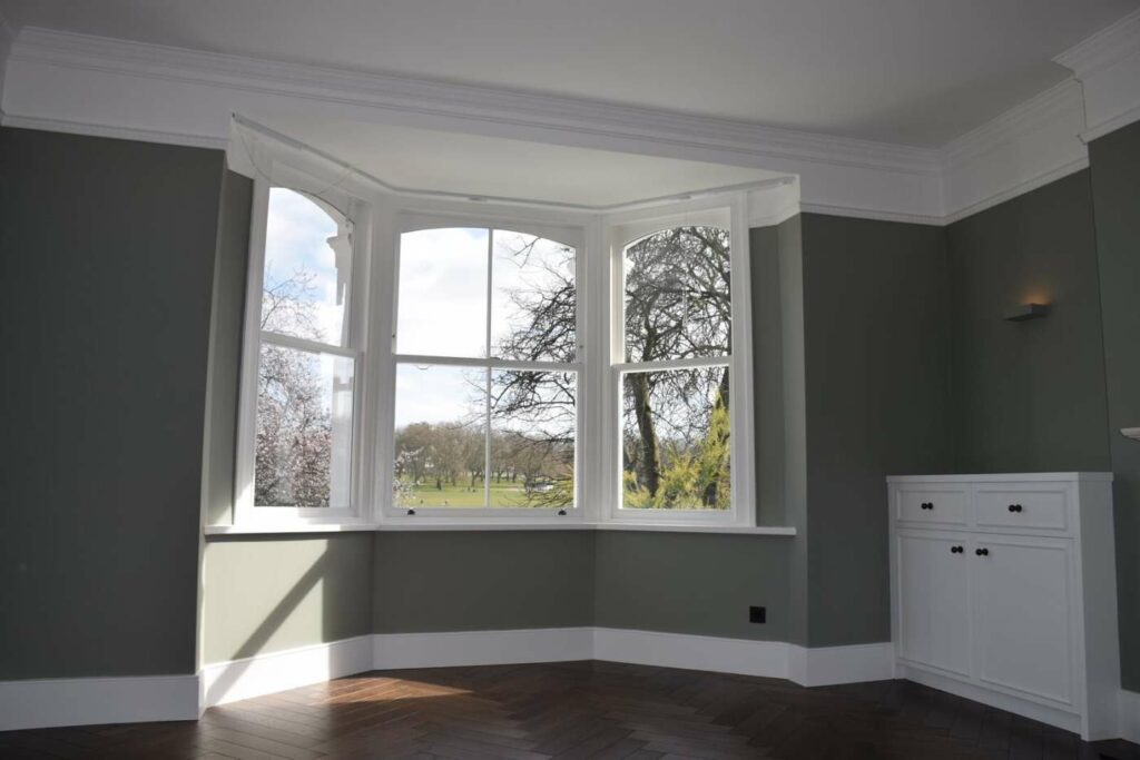 New timber sash windows fitted in a bay window