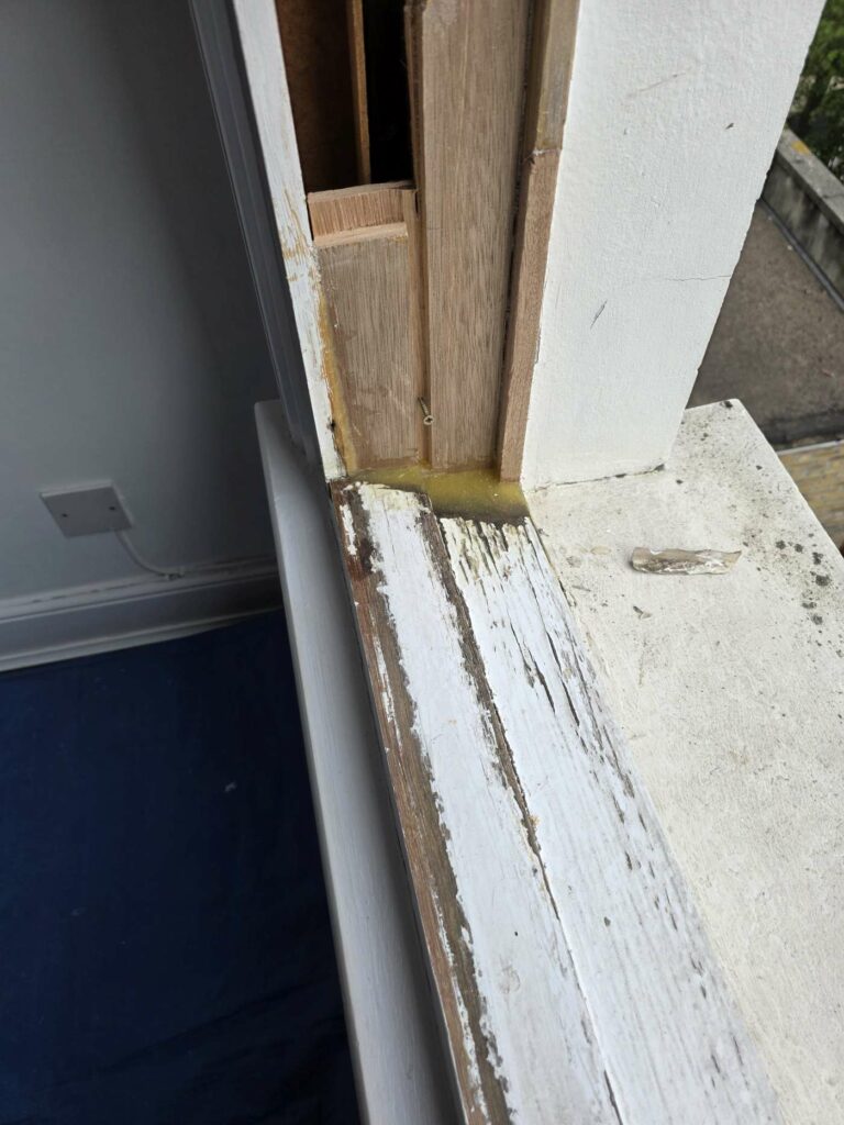 Local timber splice fitted after decayed material was removed from a sash window frame
