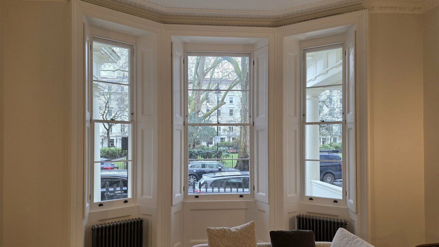 Timber sash windows overlooking a London street