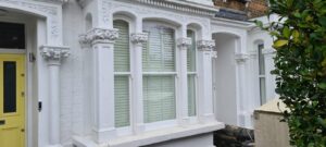Well-maintained timber sash windows on a period property