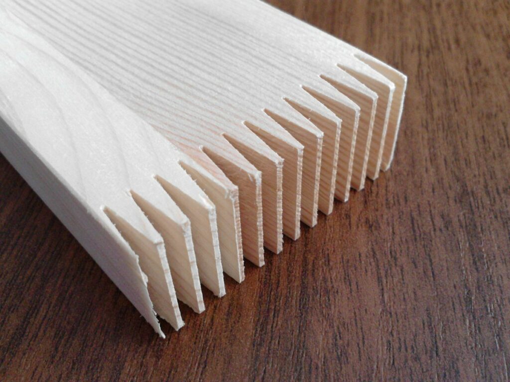 Timber end machined with interlocking fingers ready for finger jointing