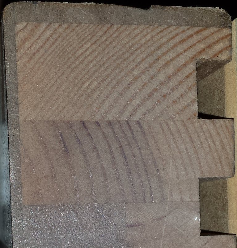 Cross-section of a laminated timber door frame showing the bonded layers